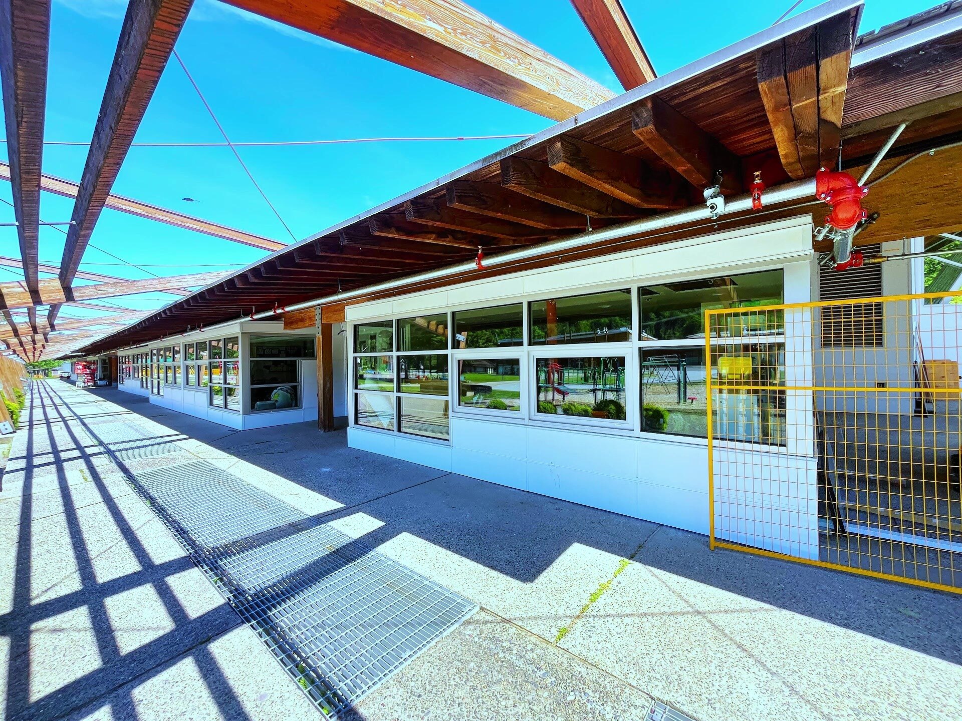 Long commercial storefront and window-wall installation