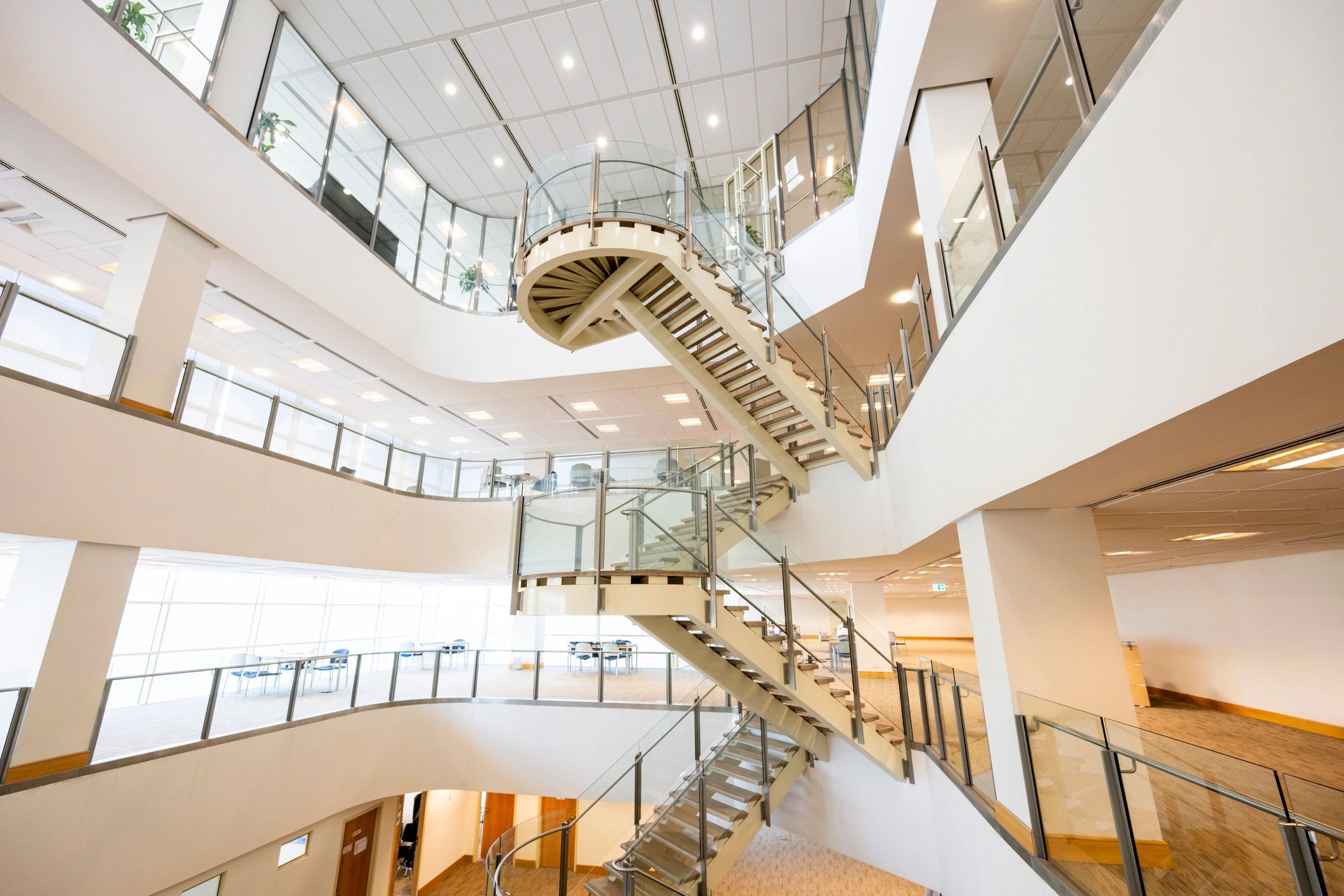 Modern interior with glass railing and architectural detail