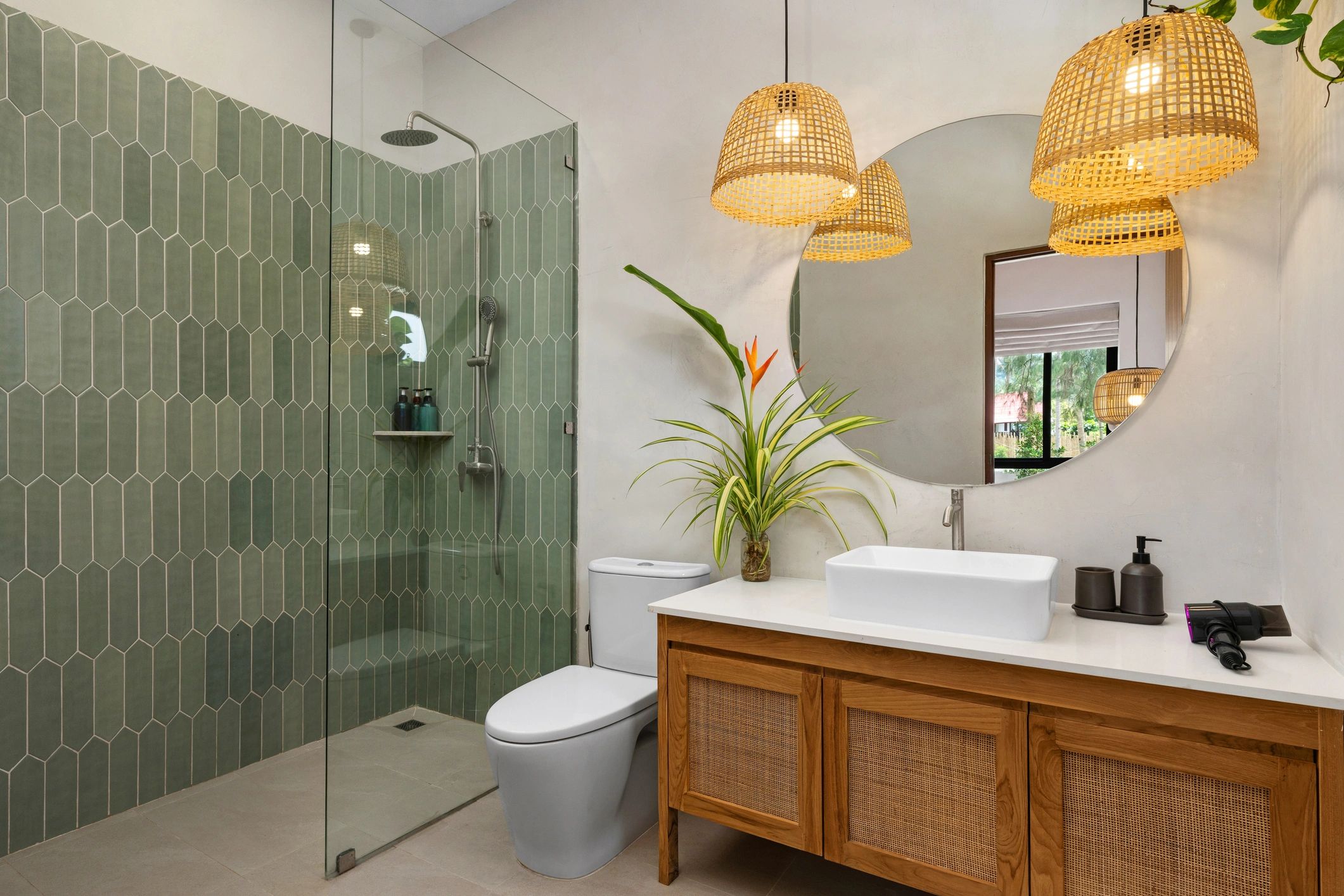 Frameless shower glass installation in a modern bathroom