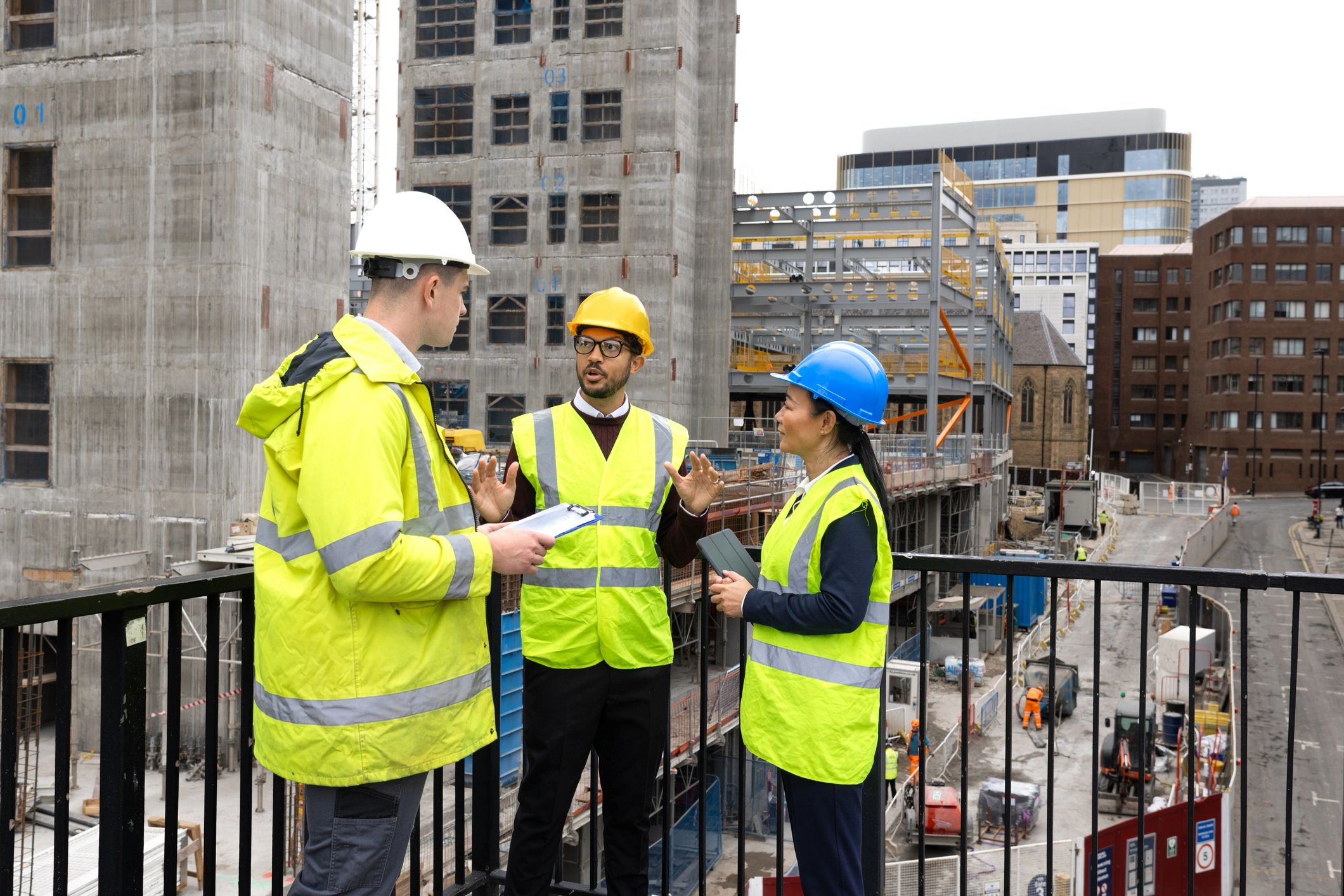 Professional installation team reviewing plans on site